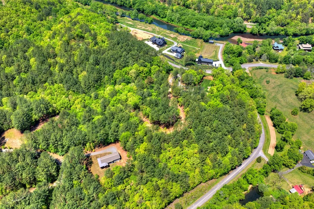 Aerial — property setting with mountain views