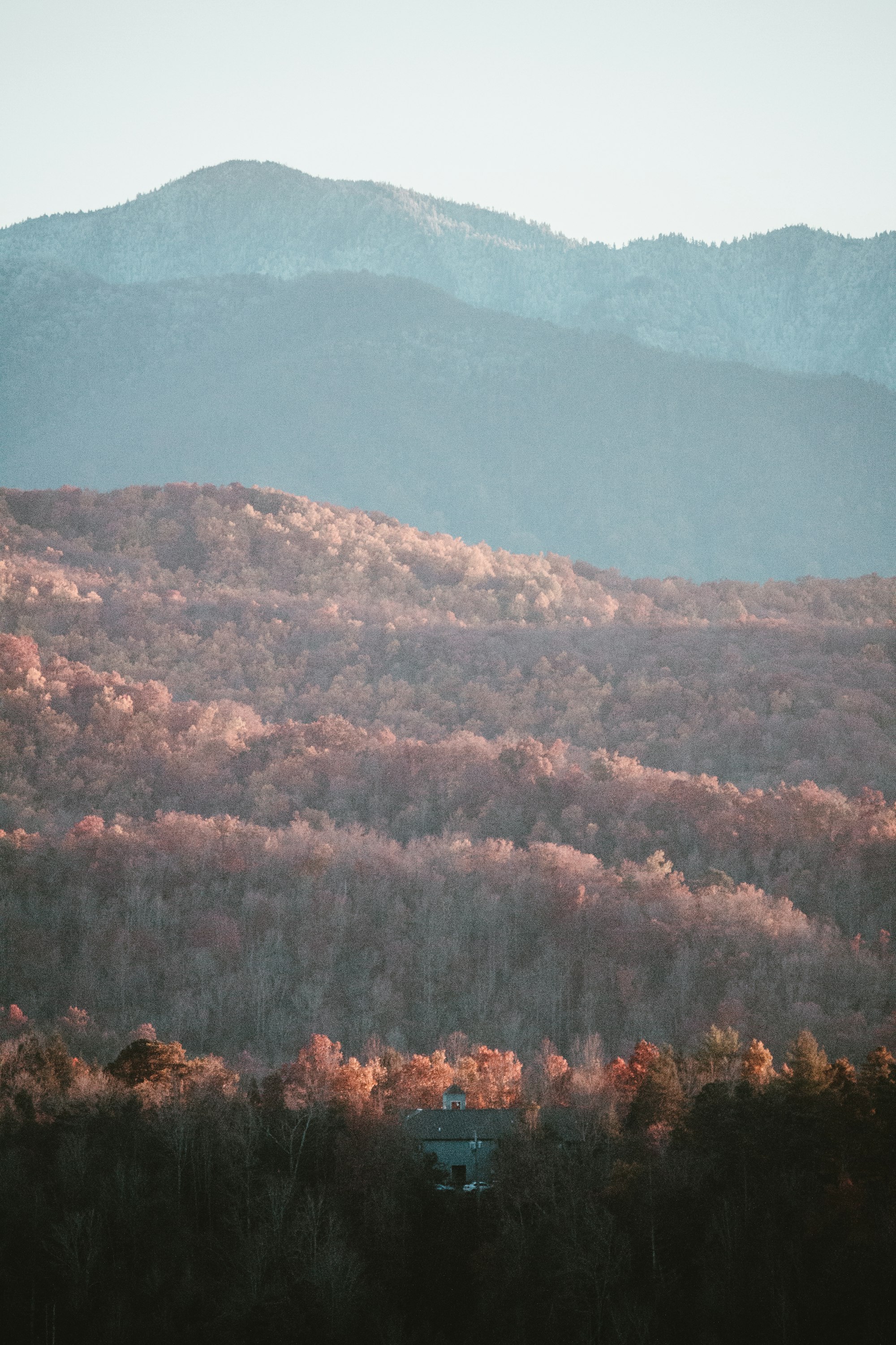 Mountain home beneath layered Appalachian ridgelines