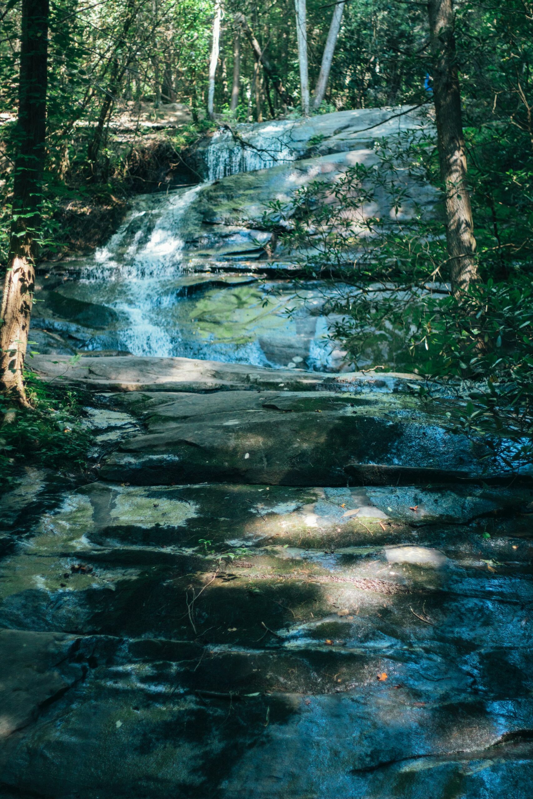 Creek cascading over rock ledges in the woods near Blue Ridge, Georgia