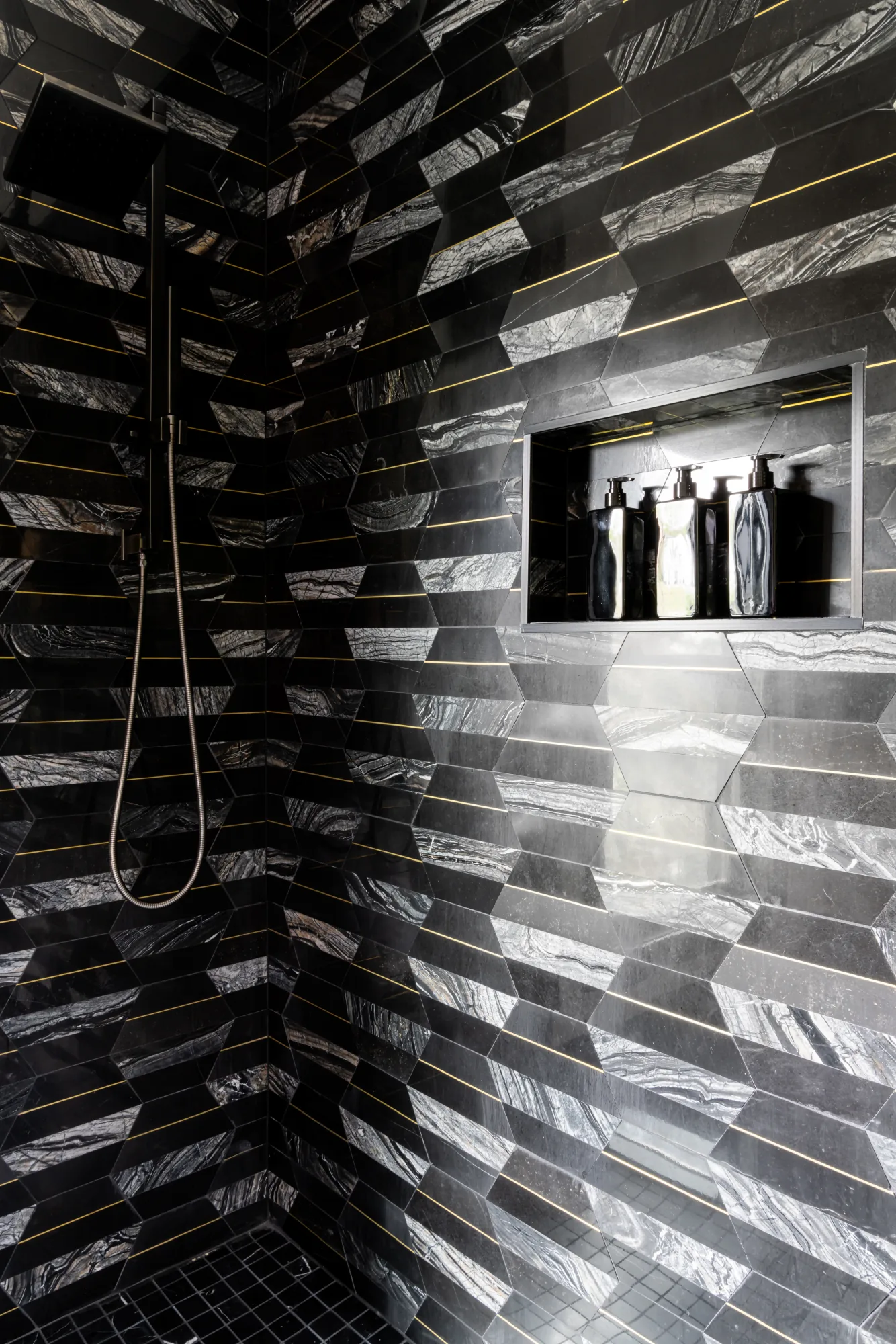Primary bathroom with Italian marble and gold inlay