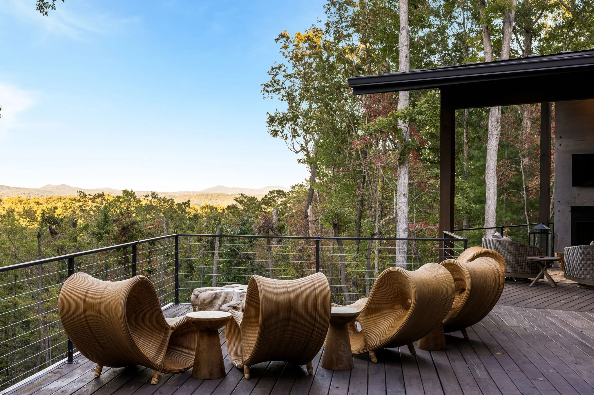 Covered deck lounge with long-range mountain views