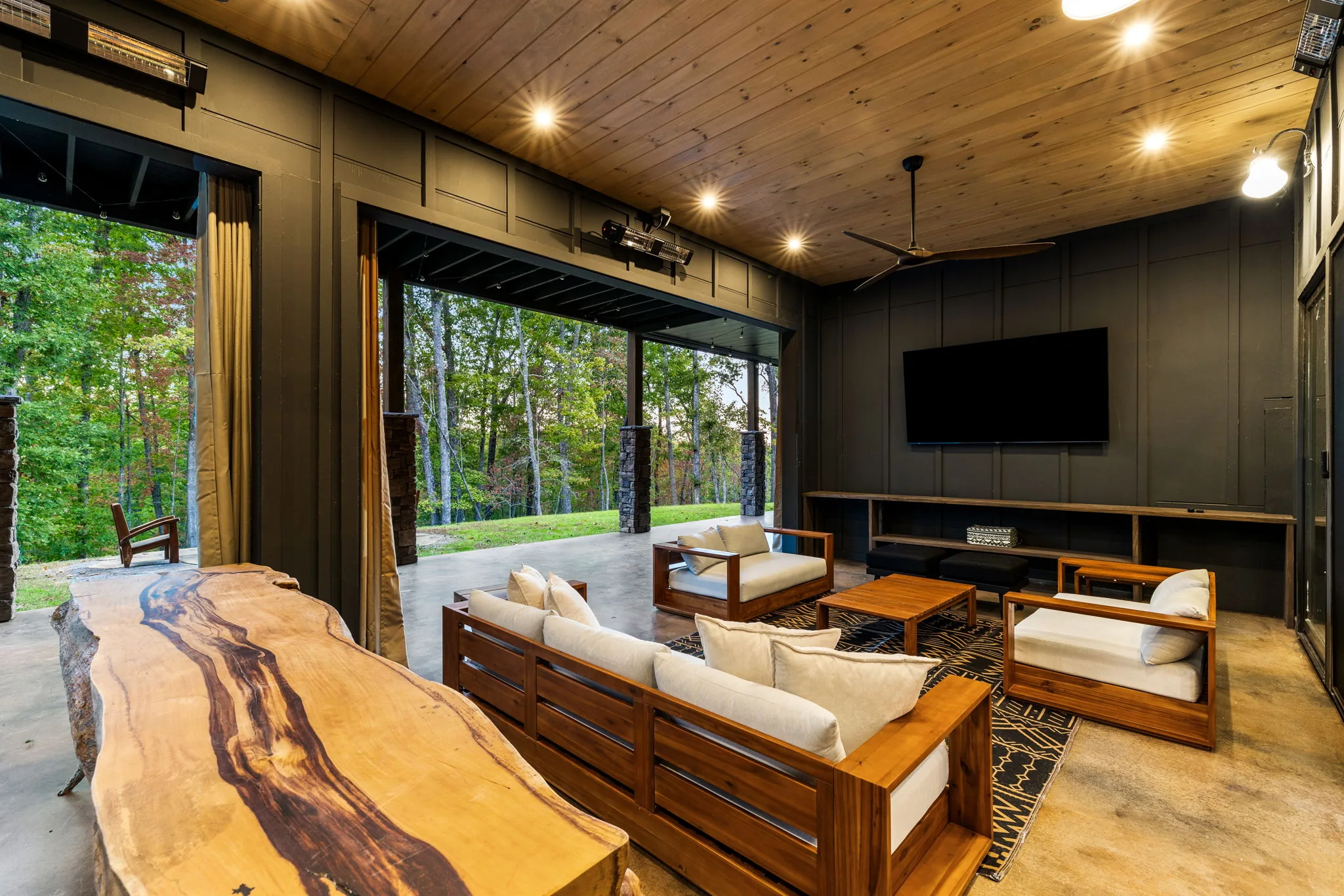 Lower-level entertainer's lounge with wet bar