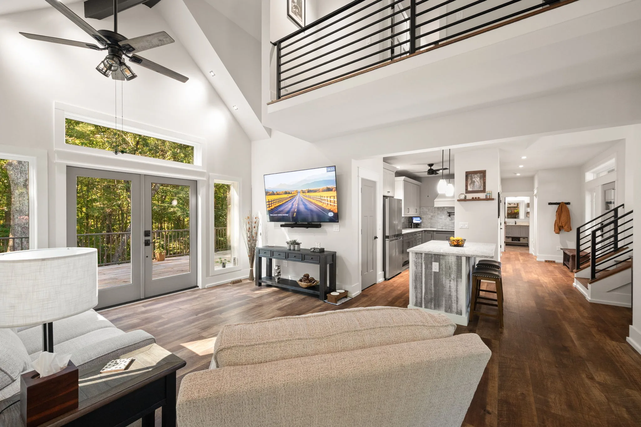 From the sofa across the open plan to the kitchen and hallway