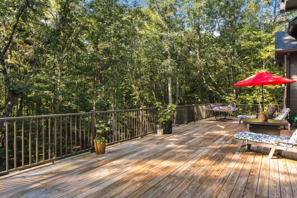 49x14 Bellawood KDAT deck looking out over the hardwoods