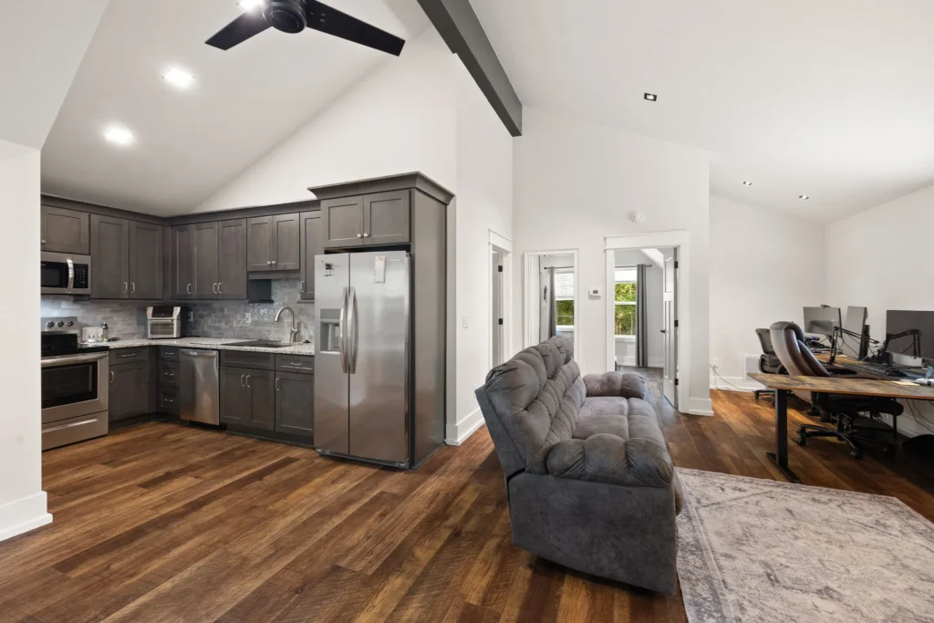 ADU great room: full kitchen, vaulted ceiling with covered beams