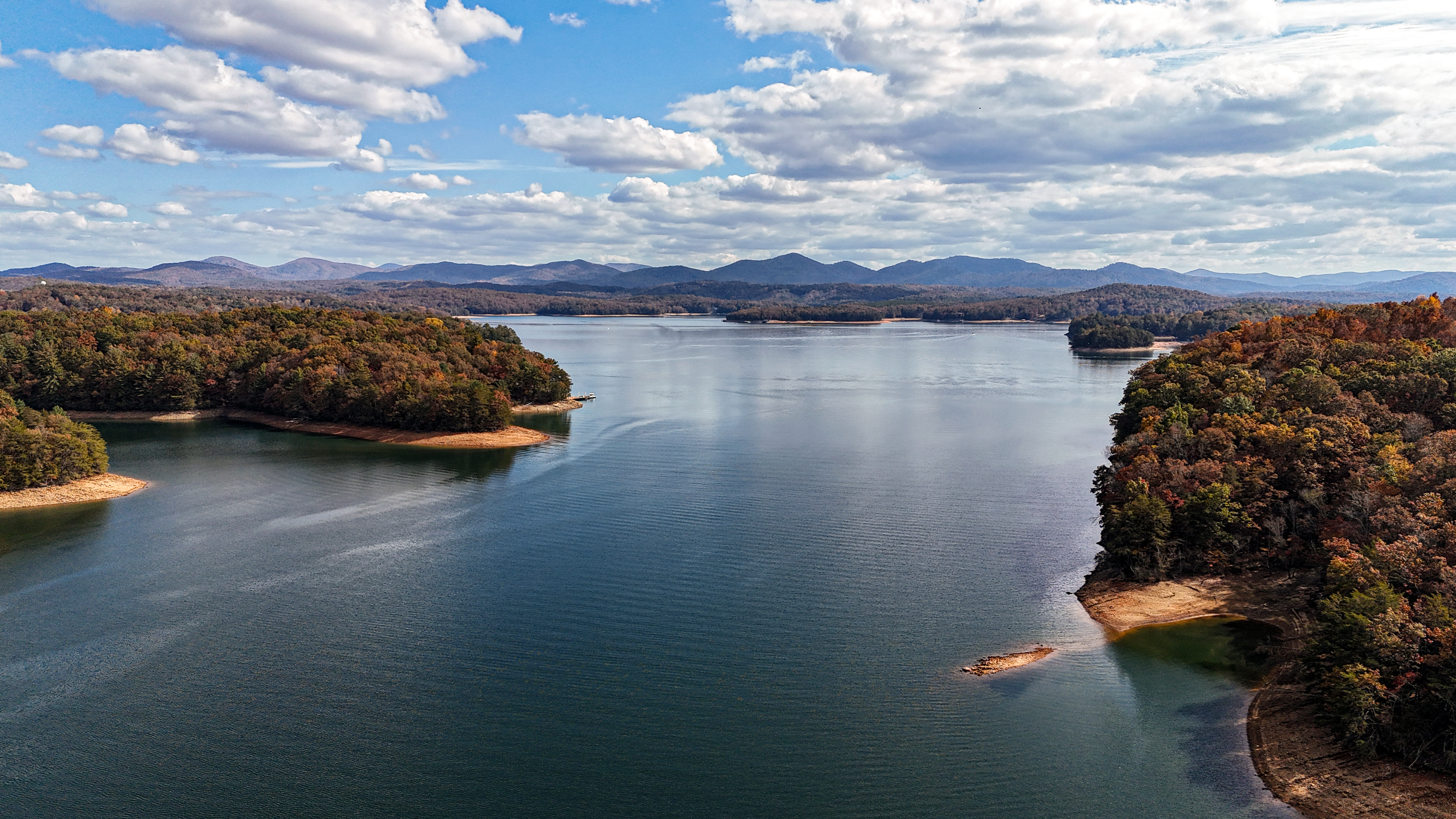 Calm water and forested shoreline at Lake Blue Ridge in Fannin County, in the North Georgia mountains